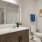 a bathroom with a large mirror