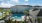 pool area with tropical landscaping and ample seating