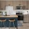 a kitchen with wooden cabinets
